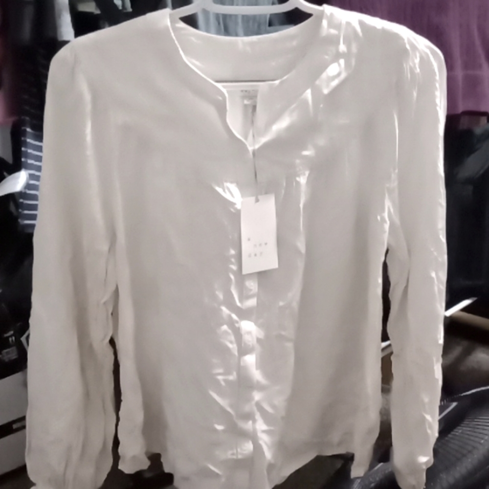 Cream colored long sleeve XS shirt